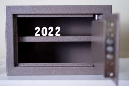 A metal safe and the year 2022, the iron curtain for the country. The concept of closure and sanction.の写真素材
