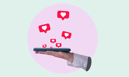 Art collage, a woman's hand holding a cell phone with hearts flying around it, Modern Art. modern designの写真素材