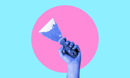 art collage. A hand with a handyman in neon. Concept of technical support, warranty service, and repair.の写真素材