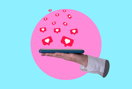 Art collage, a woman's hand holding a cell phone with hearts flying around it, Modern Art. modern designの写真素材
