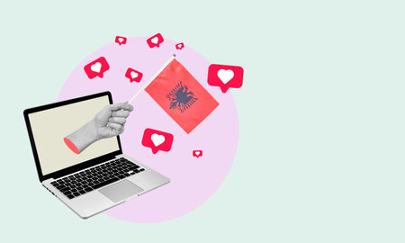 Art collage, the hand with the flag of Albania from a laptop with hearts and barks on a light background. Concept of news or broadcast from a laptop in Albania.の写真素材