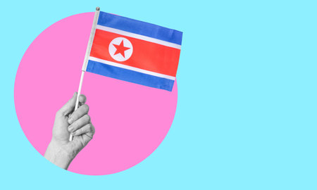 A collage of modern art. Female hand holding DPRK flag in a circle, neon background, with space for...