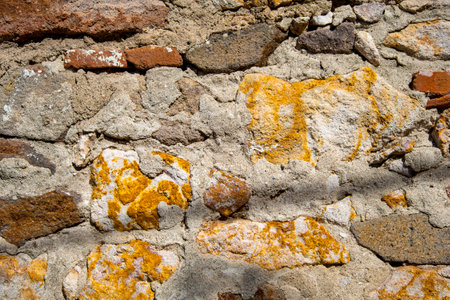 Ancient medieval stone wall texture background. The concept of architecture and texture.の写真素材