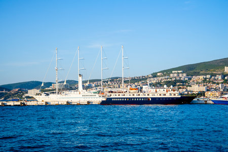 Ships in Kusadasi moored on a summer and sunny day. The concept of tourism and travel.の写真素材