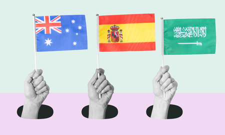 Art collage, Hand with the flag of Spain, Saudi Arabia and Australia on a light background. The concept of enlightened Spain, Saudi Arabia and Australia in economics and politics.の写真素材