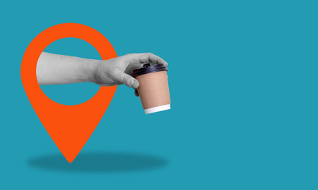 A place for copy, Art collage, the hand with a coffee cup with navigation sign on blue background. Concepts of art, creativity, imagination, poster, and advertising.の写真素材