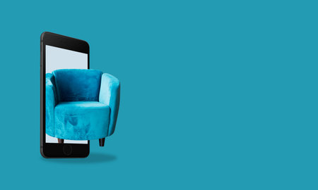 Creative photo, collage artwork cell phone and blue chair poster picture with space for text. The concept of advertising the purchase of furniture.の写真素材
