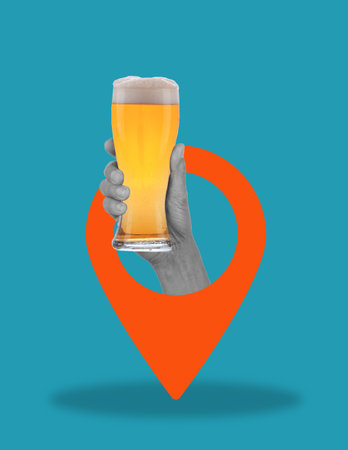 beer party. Contemporary art collage of a human hand holding a glass of foamy beer, isolated on a blue background with a navigation icon. Concept of art, creativity, imagination, poster. Place for advertisingの写真素材