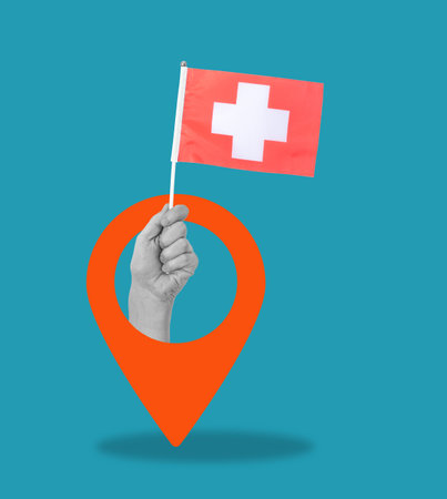 Art collage, Hand with Swiss flag and navigation icon on blue background. The concept of travel and tourism.の写真素材