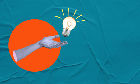 Creativity and new ideas in business. art collage. A hand and a light bulb on a blue paper background. Concept of ideas and inspiration.の写真素材