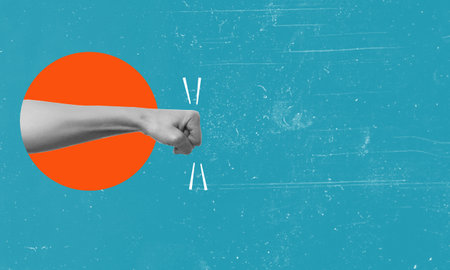art collage. The fist is a metaphor for aggression and confrontation, a strong blow in a place to copy. The concept of advertising on a blue background.の写真素材