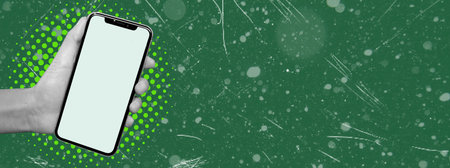 Cell phone with white screen in woman's hand, isolated on green background. Blank space for text....