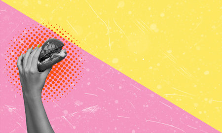 Contemporary art collage featuring a hand with a hamburger with space for text. The concept of...