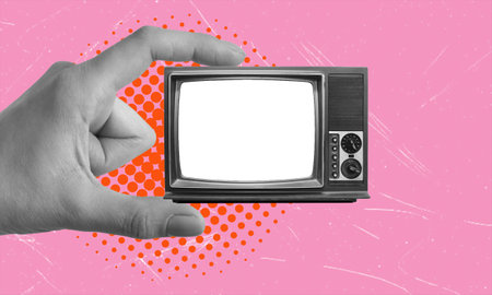 Art collage, TV in hand on pink background with copy space. Concept of news and advertising.の写真素材