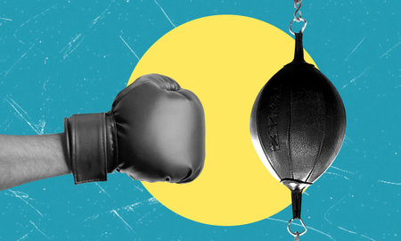 Creative image of a hand in boxing gloves hitting a punching bag on blue background. Concept of inspiration, creativity and sport. Artistic collage.の写真素材