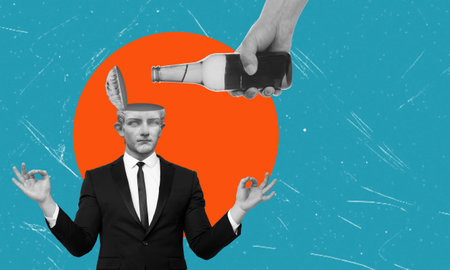 A man in a suit is meditating with his hands in the air, while another hand pours liquid from a bottle into his open head. There is an orange circle in the background.の写真素材