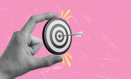 Contemporary art collage art depicting a hand holding a target. Concept of goal achievement,...