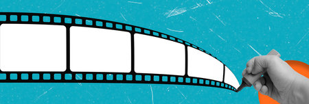 A hand is skillfully drawing on a blank film strip with a pencil, set against a vibrant blue background. This highlights the fusion of art and cinema, emphasizing creativity in storytelling.の写真素材