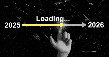 A hand points at a timeline indicating the year transition from 2025 to 2026. The visual features loading elements indicating progress and forward movement over time.の写真素材