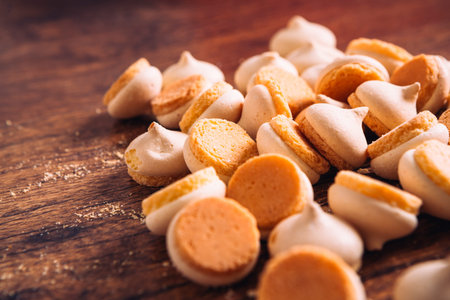 few pieces of mini cookies on  wooden background