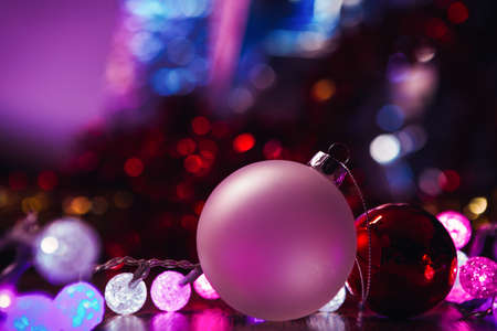 Christmas decorative glowing garland and white red  ballの写真素材