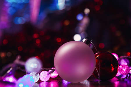 Christmas decorative glowing garland and white red  ballの写真素材