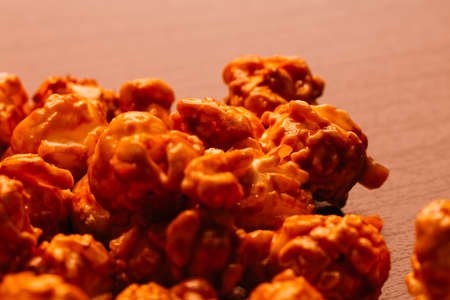 many popcorn close-up on a dark background.の写真素材