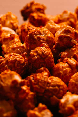 many popcorn close-up on a dark background.の写真素材