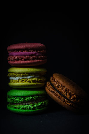 Colorful macarons cakes. Small French cakes. Sweet and colorful french macaroons.