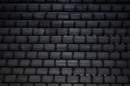 Black brick wall texture, brick surface for background. Vintage wallpaper.の写真素材