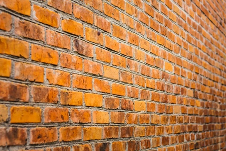 Perspective Of A Dirty Red Brick Wall. Selective Focusの写真素材