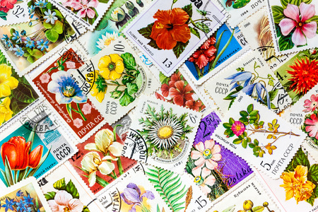 MOSCOW, RUSSIA â JANUARY 8, 2014: Stamps printed in the USSR, united by one theme - "Flowers", arranged backgroundのeditorial素材