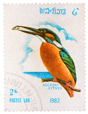 LAOS - CIRCA 1982: A stamp printed in LAOS shows Common Kingfisher (Alcedo atthis), from series Birds, circa 1982のeditorial素材