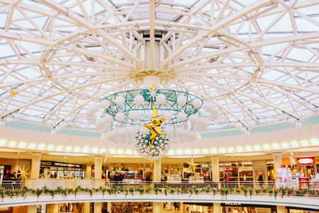 MINSK - OCTOBER 1: "Stolitsa" is a major shopping center in Belarussian capital on October 1, 2013 in Minsk, Belarus. TC âStolitsaâ is situated at the central square of Minsk â Nezavisimosty square. All its pedestrian part is a roofing of undergrounのeditorial素材