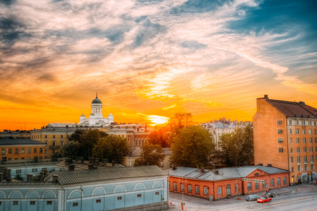 Cityscape And Helsinki Cathedral At Sunset With Dramatic Sky.の写真素材