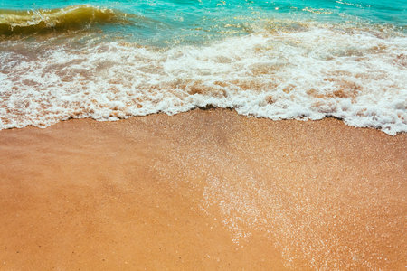 Soft Sea Ocean Waves Wash Over Golden Sand Background