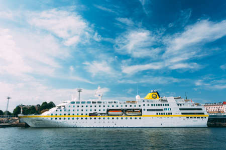 HELSINKI, FINLAND - JULY 28, 2014: Modern passenger ferry boat stays in the seaport.のeditorial素材