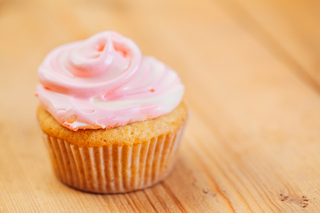 Dessert Sweet Gourmet Cupcake On Wooden Table Backgroundの写真素材
