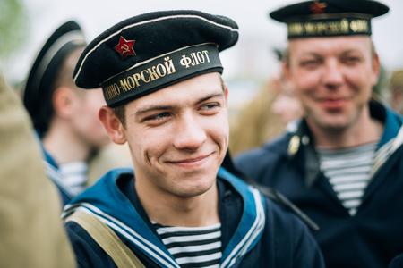 MOGILEV, BELARUS - MAY, 08, 2015: Unidentified re-enactor dressed as Soviet sailor during events dedicated to 70th anniversary of the Victory of the Soviet people in the Great Patriotic War.のeditorial素材