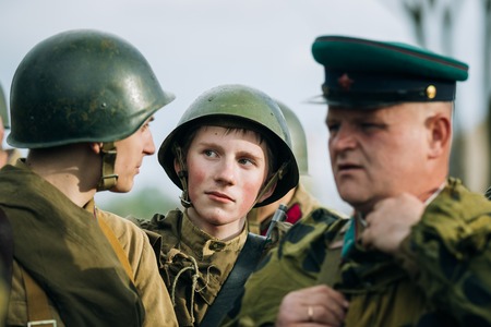 MOGILEV, BELARUS - MAY, 08, 2015: Unidentified re-enactors dressed as Soviet soldiers during events dedicated to 70th anniversary of the liberation of Belarus from Nazi invaders and the Victory of the Soviet people in the Great Patriotic War.のeditorial素材