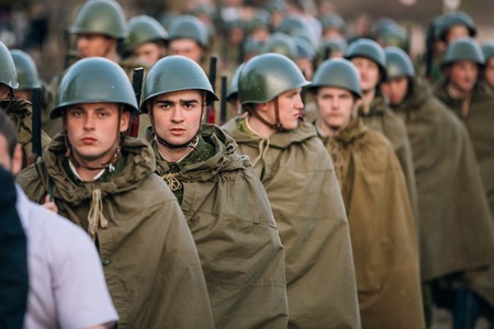MOGILEV, BELARUS - MAY, 08, 2015: Parade of unidentified re-enactors dressed as Soviet soldiers during events dedicated to 70th anniversary of the Victory of Soviet people in the Great Patriotic War.のeditorial素材
