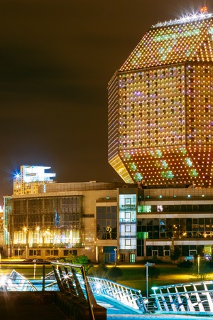 MINSK, BELARUS - SEPTEMBER 28, 2014: Unique Building Of National Library Of Belarus In Minsk At Night Scene. Building Has 23 Floors And Is 72-metre High. Library can seat about 2,000 readers and features a 500-seat conference hall.のeditorial素材