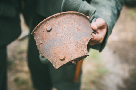Old Rusty Shell Fragment Found In Belarusian Forest On Battlefield Of World War IIの写真素材