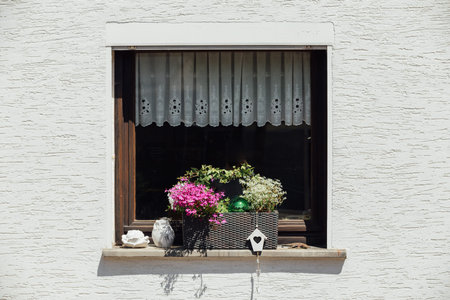 Window Decorated with Flowers in Western Germany