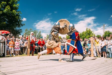 MINSK, BELARUS - JULY 19, 2014: Historical restoration of knightly fights on festival of medieval cultureのeditorial素材