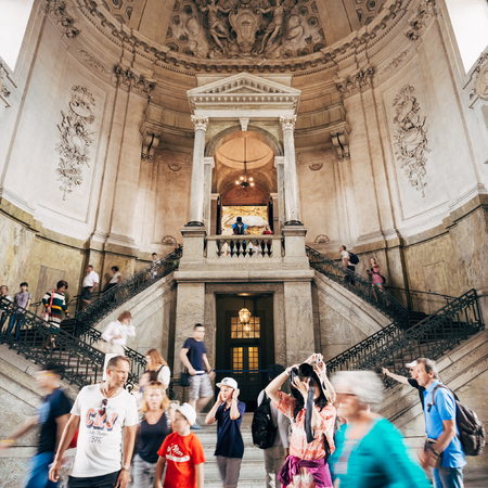 STOCKHOLM, SWEDEN - JULY 30, 2014: Tourists visit and photograph Royal palace in Gamla Stan, where king Carl XVI Gustaf has his working office.のeditorial素材