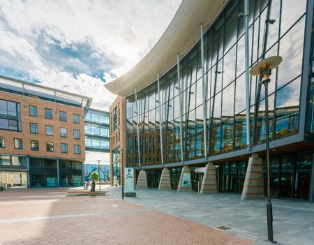 OSLO, NORWAY - JULY 31, 2014: Typical Example Of Scandinavian Architecture. Exterior Building in Aker Brygge is a popular area for for shopping, dining, and entertainment in Oslo, Norwayのeditorial素材