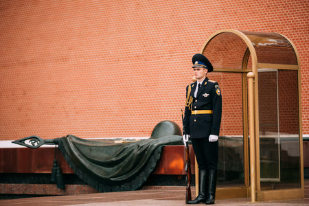 Moscow, Russia - May 24, 2015: Post honor guard at the Eternal Flame in Moscow at the Tomb of the Unknown Soldier - Post number 1 in the Alexander Garden in Moscow close by Kremlin wallsのeditorial素材