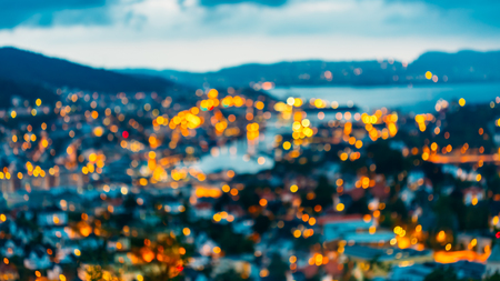 Blurred Bokeh Architecture Background of Bergen, Norway. Real Blurred Colorful Bokeh Background With Defocused Lightsの写真素材