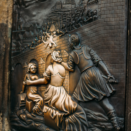 Detail of old bas-relief below statue of St. John of Nepomuk on Charles Bridge in Prague, Czech Republic. According to the legend touching it brings luck.の写真素材